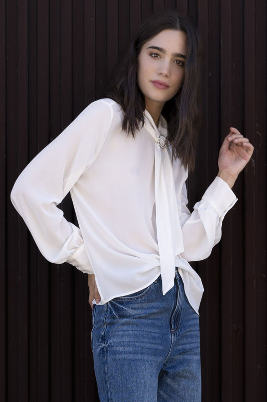 Blusa con dettaglio gioiello